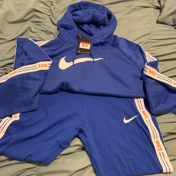 blue nike jogging suits